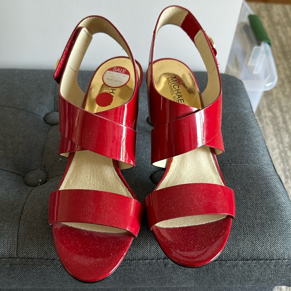 NEW MICHAEL KORS RED PATENT LEATHER RED SHOES. SIZE 9 HEEL 3 1/2"